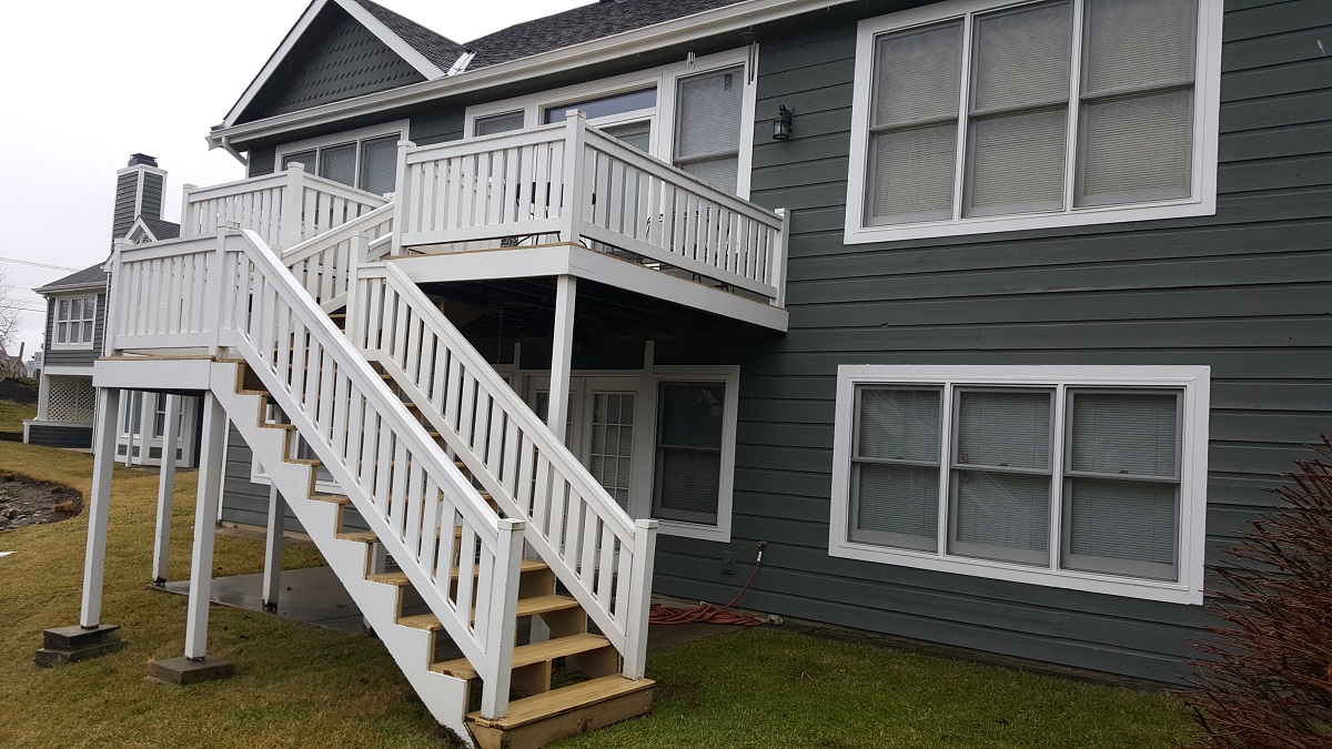 Before, the homeowner had an expanse of wood deck and stairs to maintain.